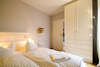 Ferienwohnung Auszeit im Ostseebad Ahrenshoop - gemütliches Schlafzimmer mit Doppelbett (160er cm Breite)